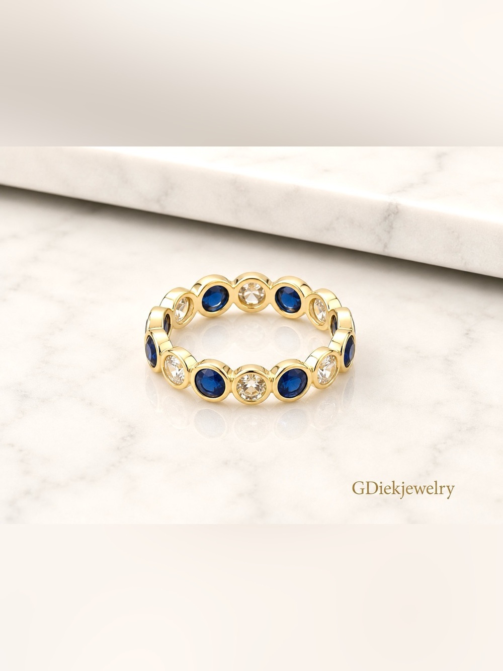 Goldfilled , Crystal and Sapphire Blue Eternity Band size 6-7